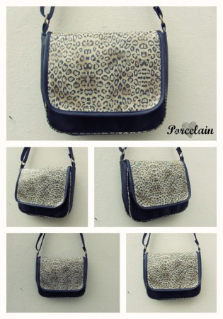 Art. 1028 Bolso Morral Negro combinado con Animal Print $175